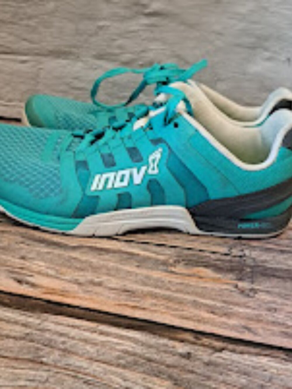 Inov8 Women's running shoes bare foot shoe size 8.5 womens 7 mens Blue and green